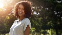 Woman smiling.